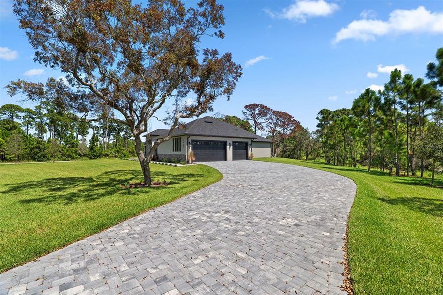 Front exterior of a new home in , Malabar, FL, highlighting curb appeal (Image 30).