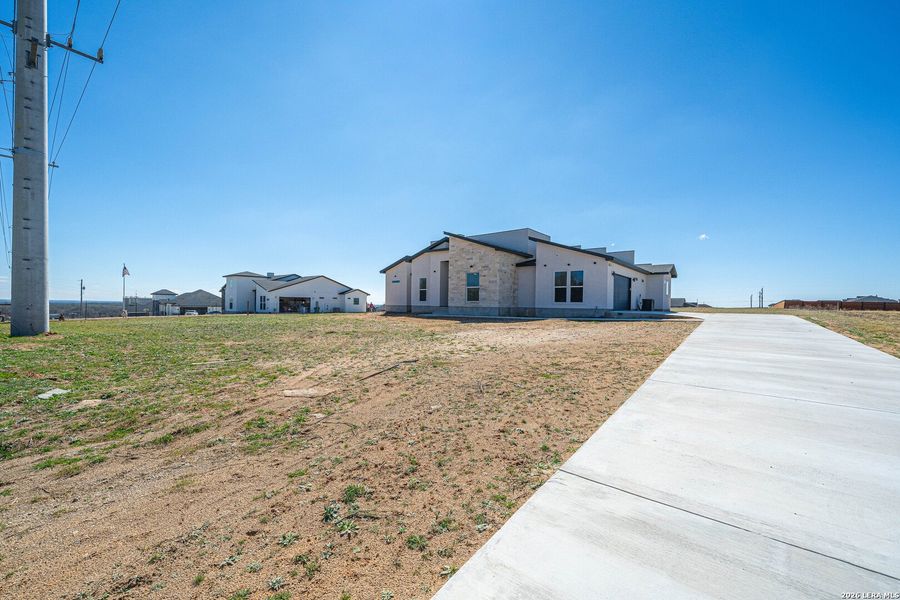 Exterior details and patio area of a home in , La Vernia (Image 29).