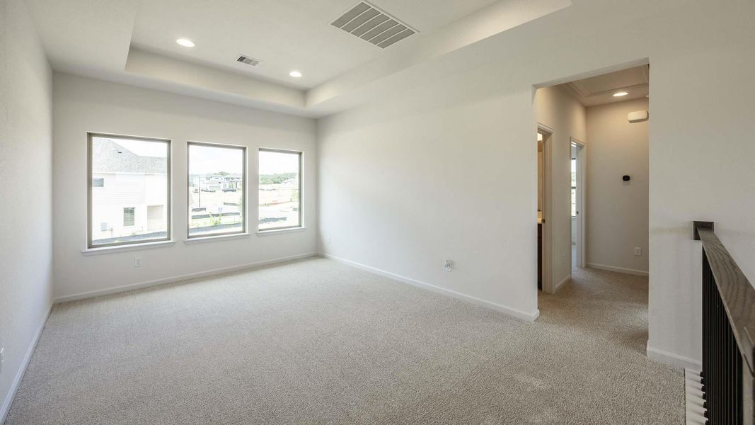 Spacious, unfurnished interior of a new home in Santa Rita Ranch - Tierra Rosa, Liberty Hill (Image 8).