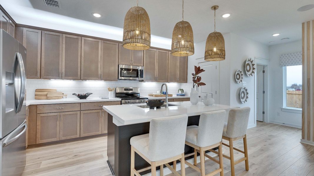 Representative furnished interior of a home built from the Meyerson by DRB Homes in Infinity Square, Kyle (Image 11).