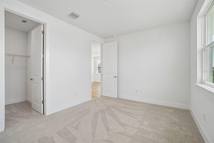 Spacious, unfurnished interior of a new home in Lagoon Residences at Epperson, Wesley Chapel (Image 42).