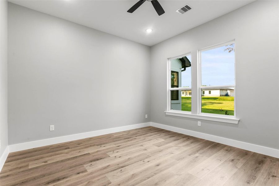 210 Hogans Ln includes an additional smaller primary bedroom with its own en-suite bath with walk-in shower, and large walk-in closet. 210 Hogans Ln includes an additional smaller primary bedroom with its own en-suite bath with walk-in shower, and large walk-in closet.