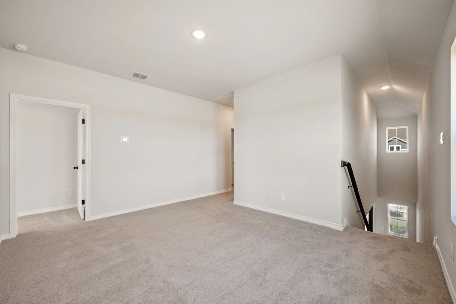 Spacious, unfurnished interior of a new home in The Homestead at Lariat, Liberty Hill (Image 45).