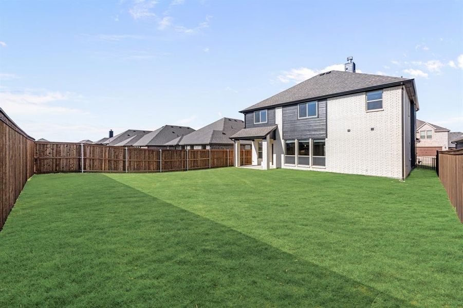 Exterior details and patio area of a home in Silo Mills, Joshua (Image 26).