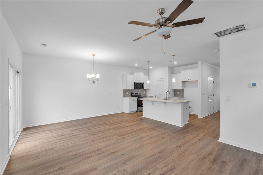 This bright, open concept living space seamlessly This bright, open concept living space seamlessly