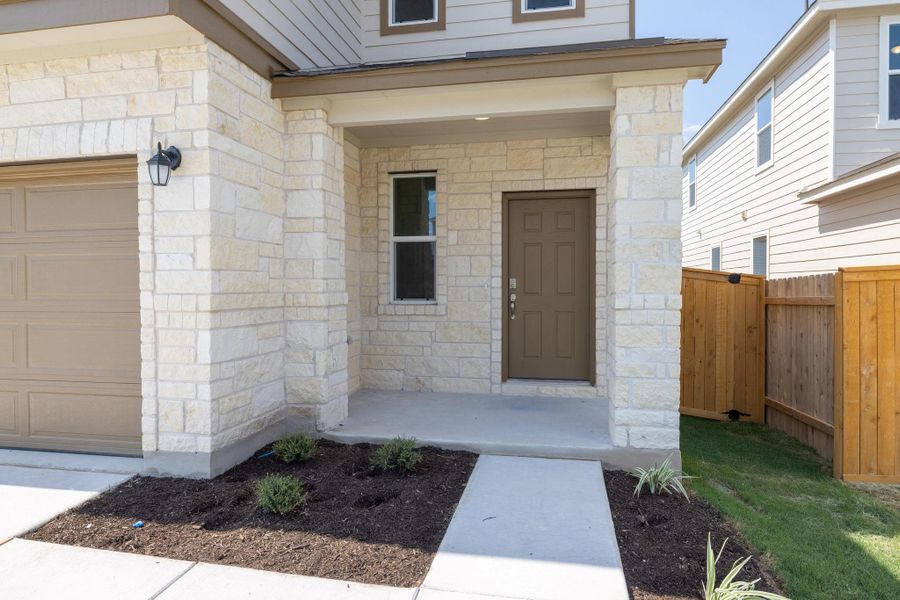 Exterior details and patio area of a home in Sonterra - Cool Water, Jarrell (Image 3).