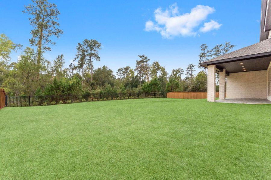 Exterior details and patio area of a home in , Magnolia (Image 25). Exterior details and patio area of a home in , Magnolia (Image 25).