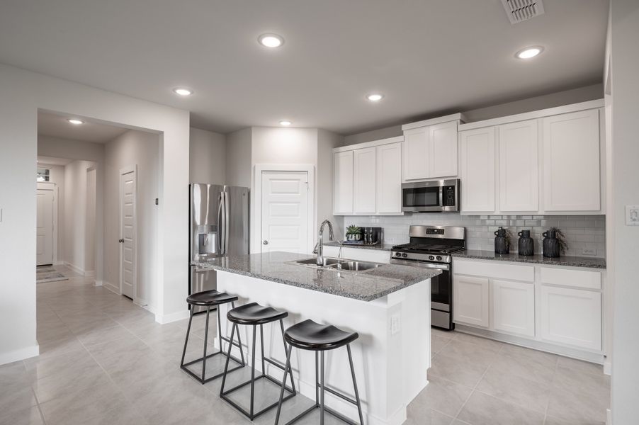 Representative furnished interior of a home built from the Caddo by Tri Pointe Homes in Mason Woods, Cypress (Image 51).