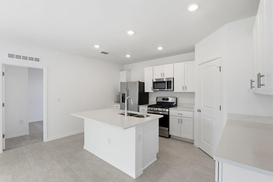 Furnished interior view inside a new home in Marion Creek, Haines City (Image 5).