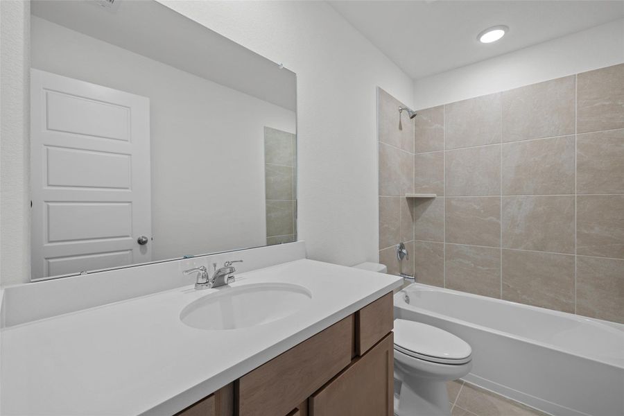 Furnished interior view inside a new home in Oakwood Estates, Waller (Image 7).