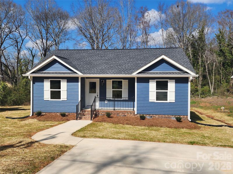 Front exterior of a new home in , Chester, SC, highlighting curb appeal (Image 13).