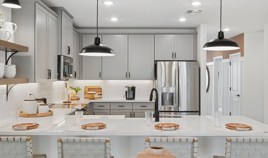 Gray cabinets and quartz countertops