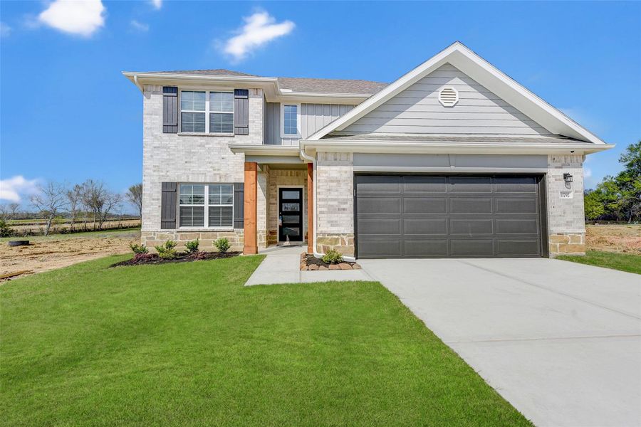 Front exterior of a new home in , Willis, TX, highlighting curb appeal (Image 1). Front exterior of a new home in , Willis, TX, highlighting curb appeal (Image 1).