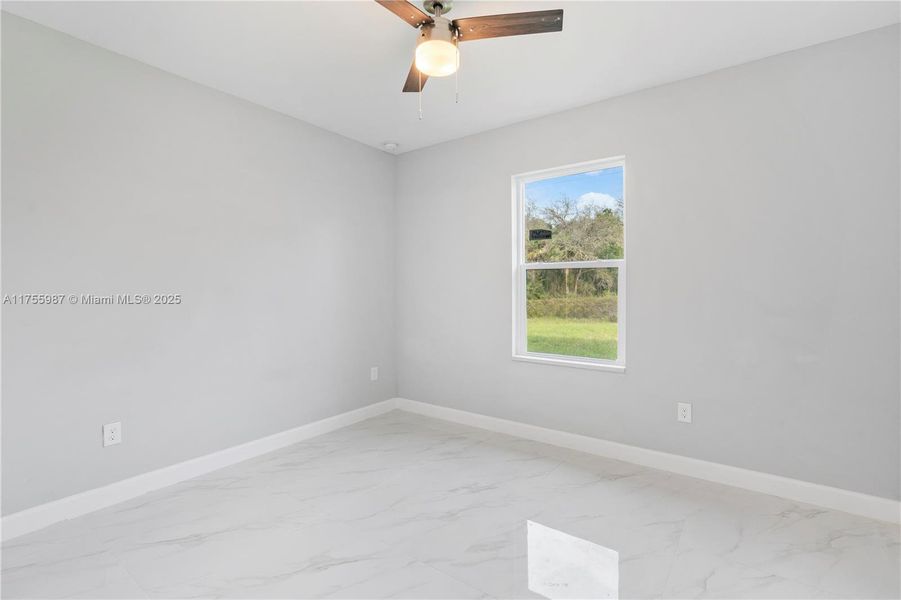 Spacious, unfurnished interior of a new home in , Lehigh Acres (Image 8).
