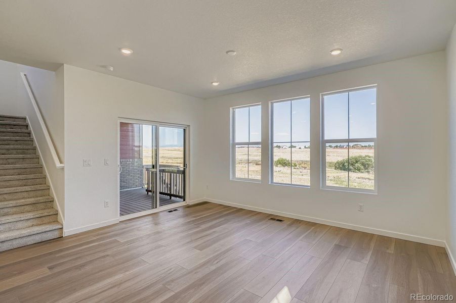 Spacious, unfurnished interior of a new home in Parterre: Paired Homes, Thornton (Image 12).