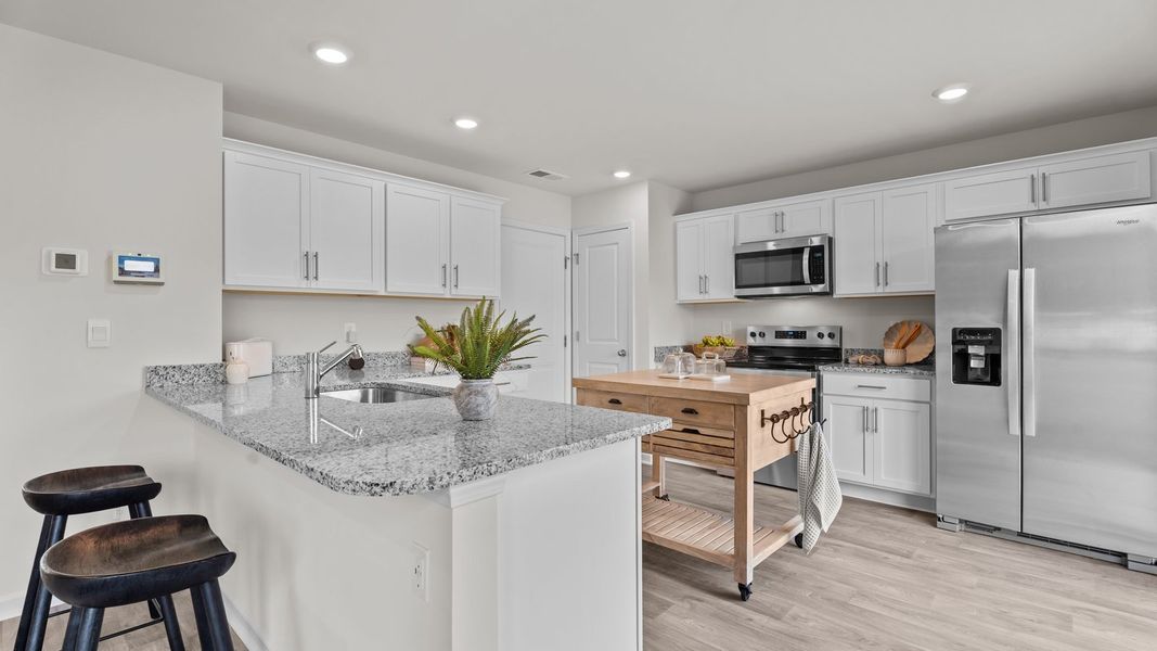 Furnished interior view inside a new home in Jetstream Park, Wilson (Image 12).