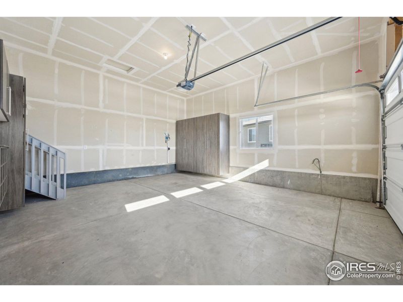 Garage with built-in shelving included