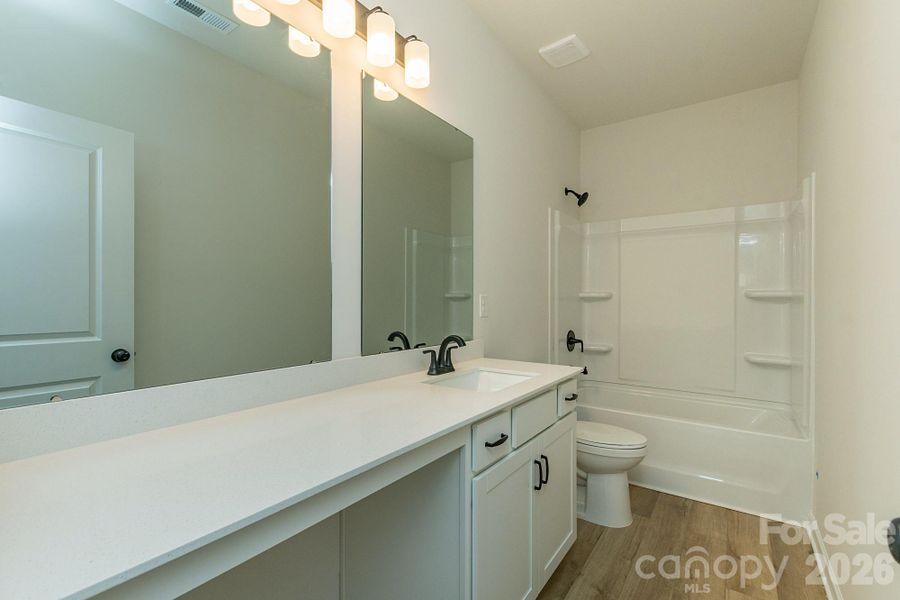 Furnished interior view inside a new home in Country Club Village, Salisbury (Image 13).