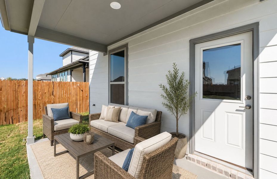 Exterior details and patio area of a home in Saddleback at Santa Rita Ranch, Liberty Hill (Image 31). Exterior details and patio area of a home in Saddleback at Santa Rita Ranch, Liberty Hill (Image 31).