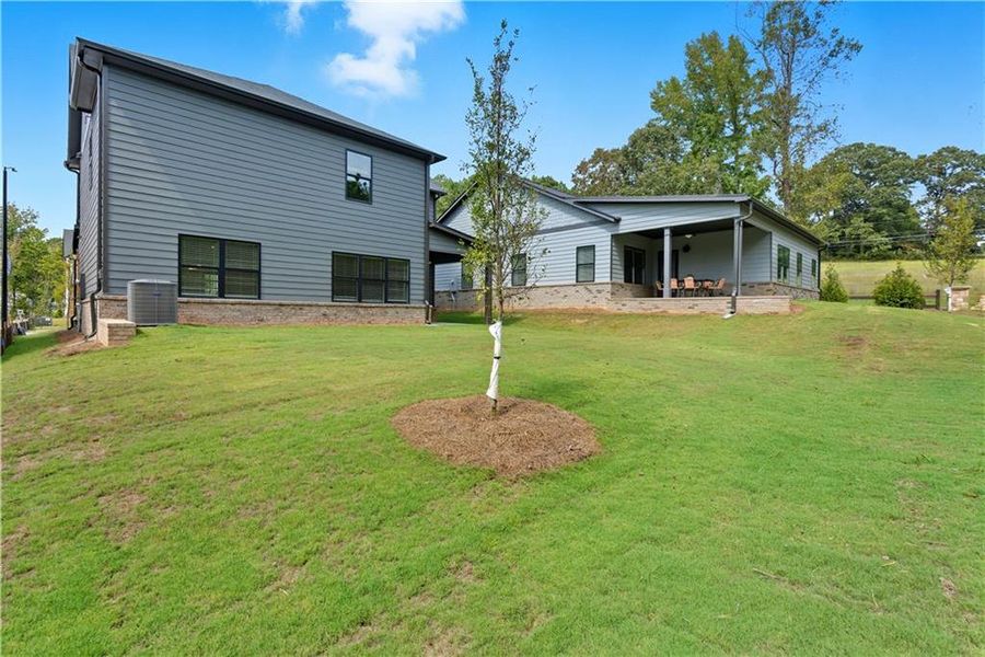 Exterior details and patio area of a home in Meadow Pines, Dallas (Image 18).
