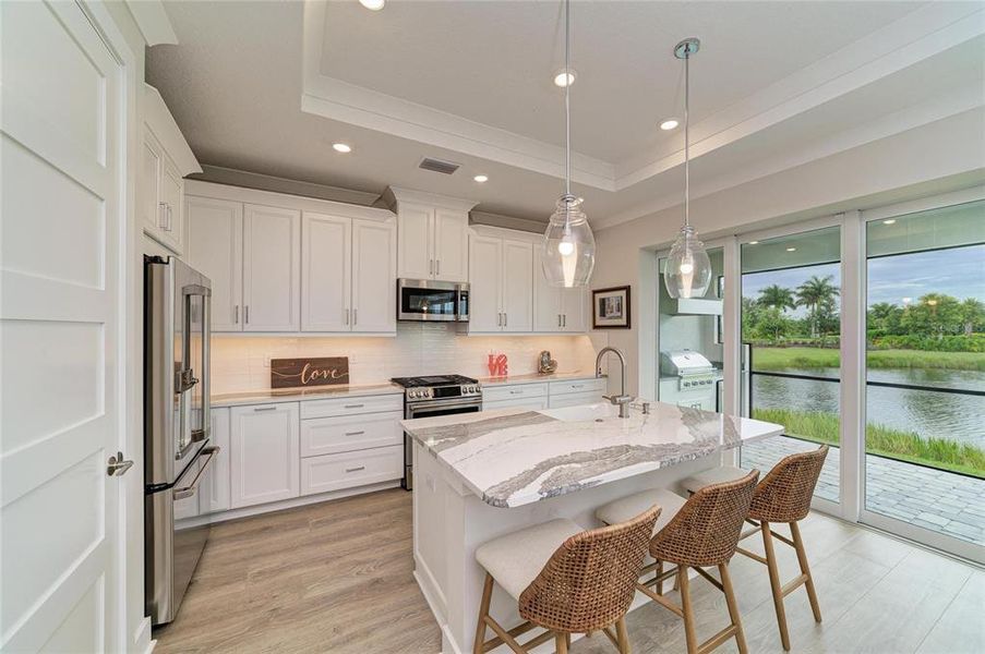 Furnished interior view inside a new home in Esplanade at Azario Lakewood Ranch, Lakewood Ranch (Image 12). Furnished interior view inside a new home in Esplanade at Azario Lakewood Ranch, Lakewood Ranch (Image 12).