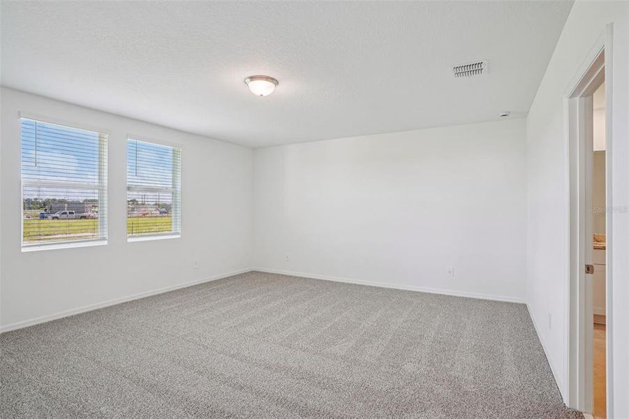 Spacious, unfurnished interior of a new home in The Meadow at Crossprairie, St. Cloud (Image 16).