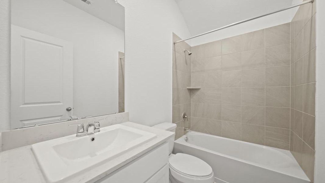 Furnished interior view inside a new home in Sunterra Lakes, Brookshire (Image 11).