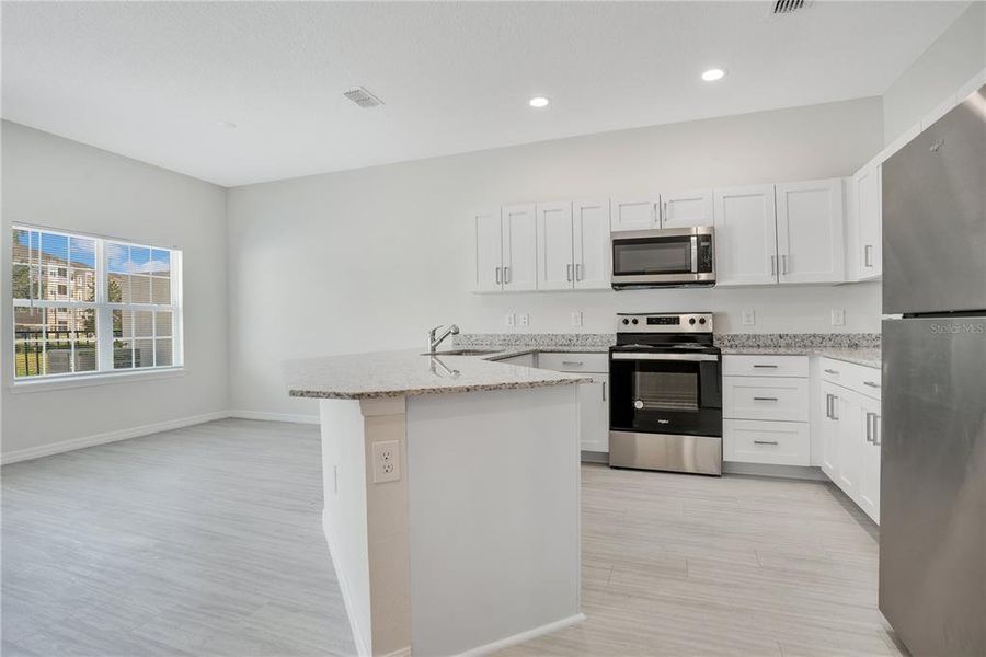Furnished interior view inside a new home in , Kissimmee (Image 15). Furnished interior view inside a new home in , Kissimmee (Image 15).
