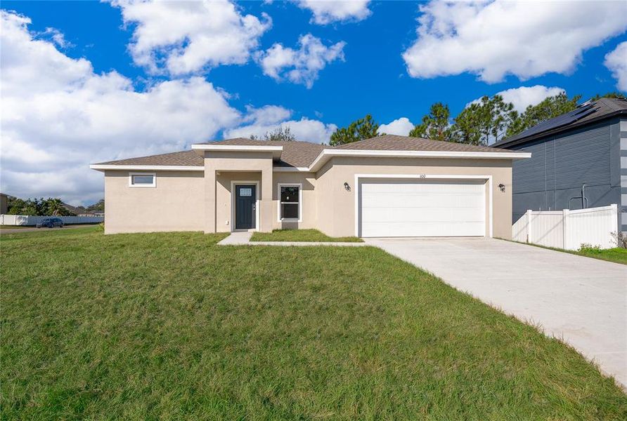Front exterior of a new home in , Kissimmee, FL, highlighting curb appeal (Image 17). Front exterior of a new home in , Kissimmee, FL, highlighting curb appeal (Image 17).