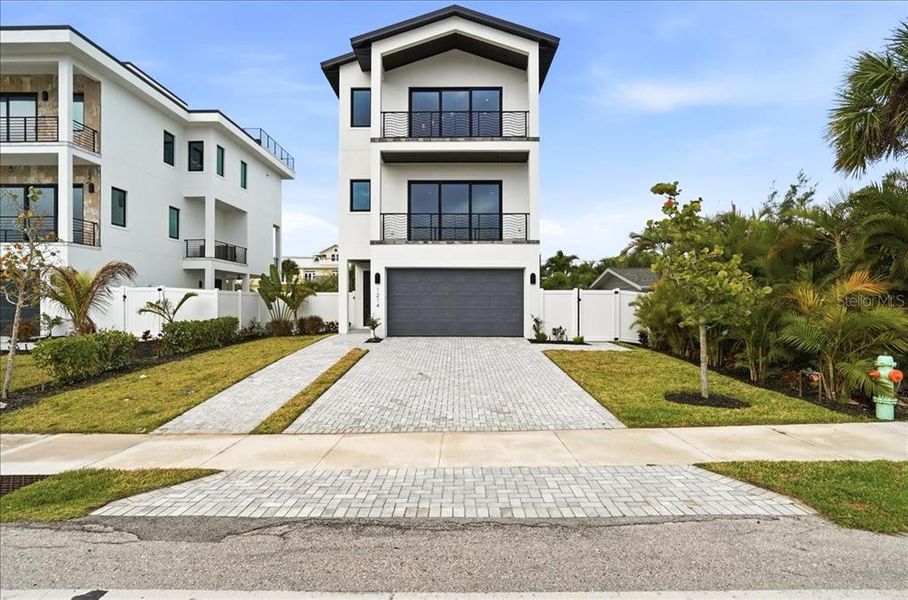 Front exterior of a new home in , Englewood, FL, highlighting curb appeal (Image 28).