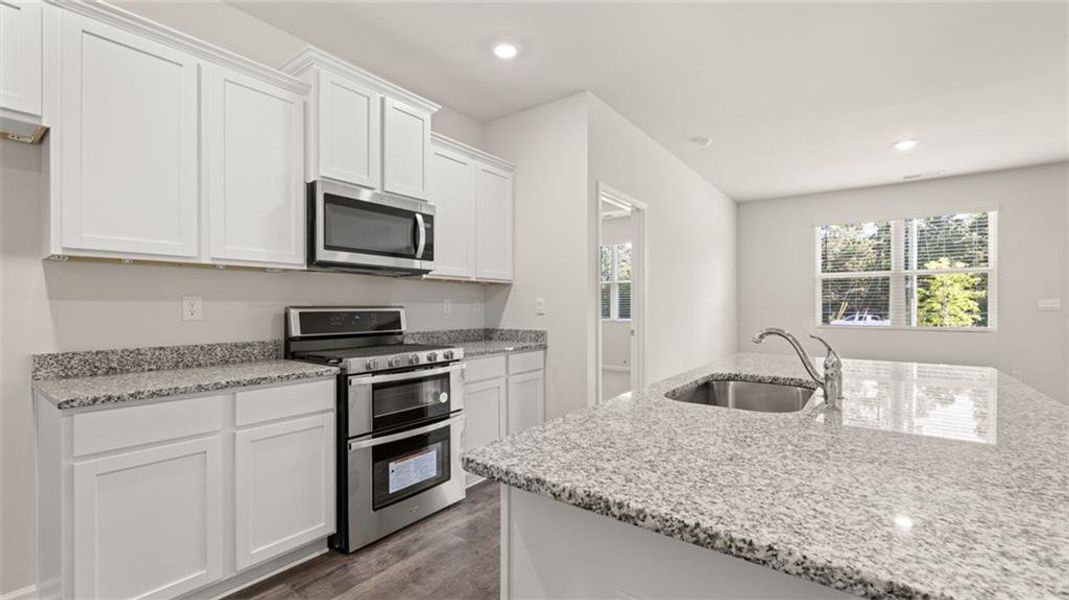 Furnished interior view inside a new home in The Preserve at Agricultural Village, Perry (Image 7).