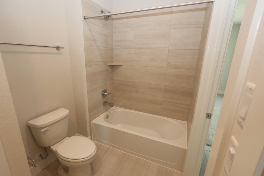 Furnished interior view inside a new home in Dunham Pointe, Cypress (Image 11).