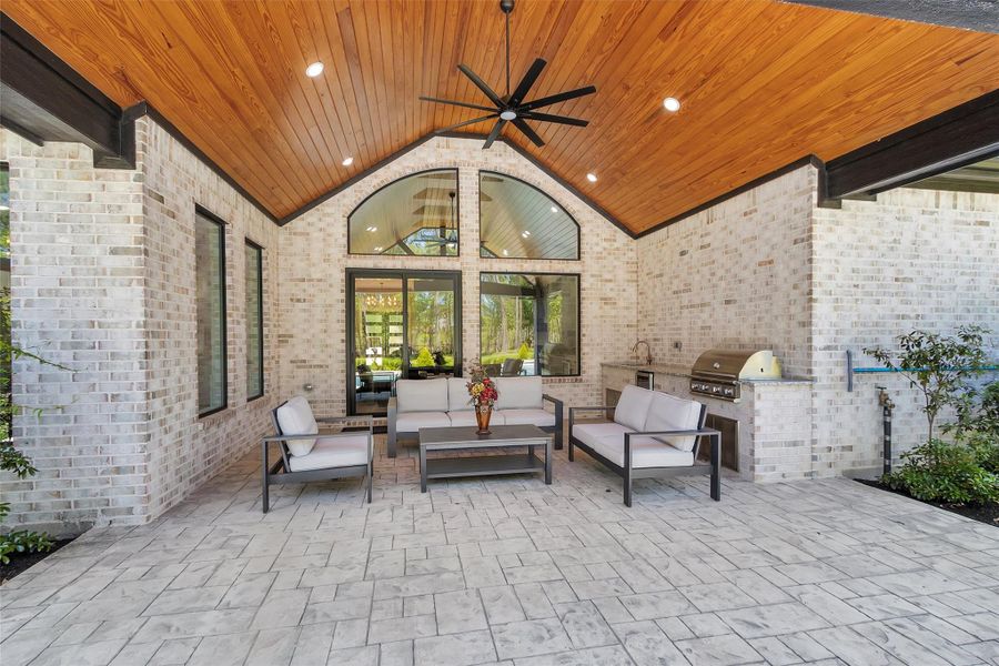 Covered patio with vaulted wood ceiling