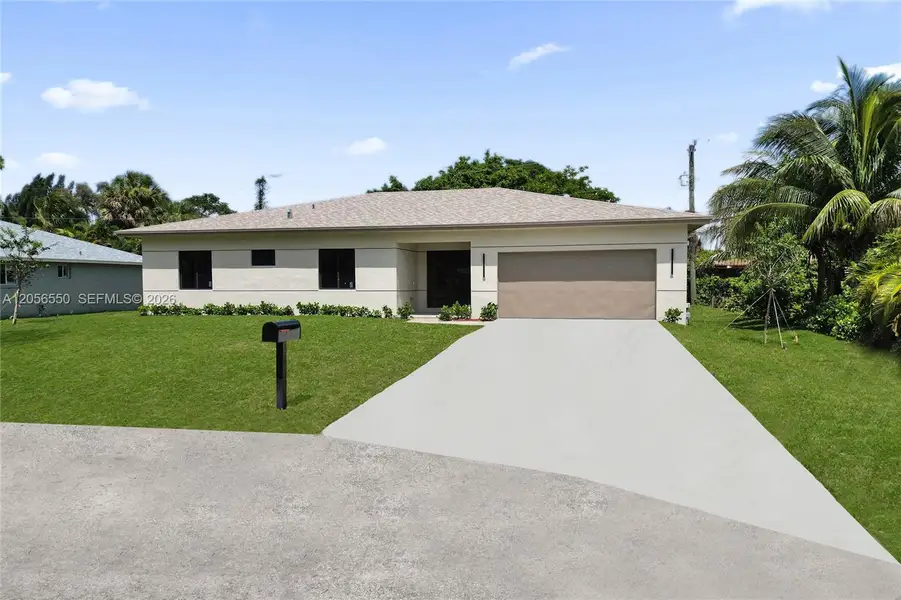 Front exterior of a new home in , Fort Lauderdale, FL, highlighting curb appeal (Image 1). Front exterior of a new home in , Fort Lauderdale, FL, highlighting curb appeal (Image 1).