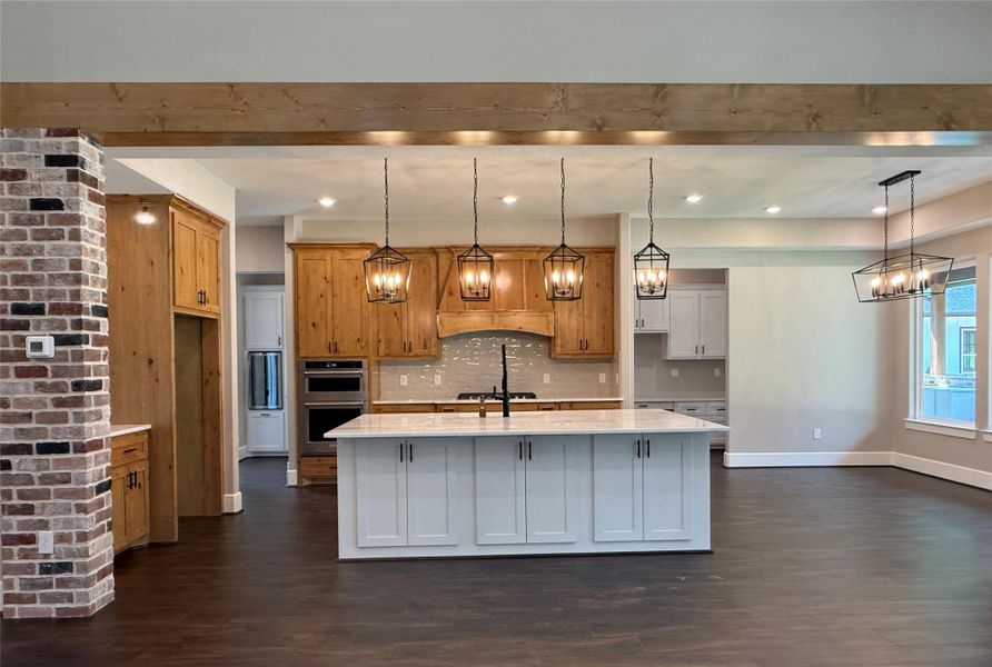 Custom knotty alder stained, soft close cabinets Custom knotty alder stained, soft close cabinets