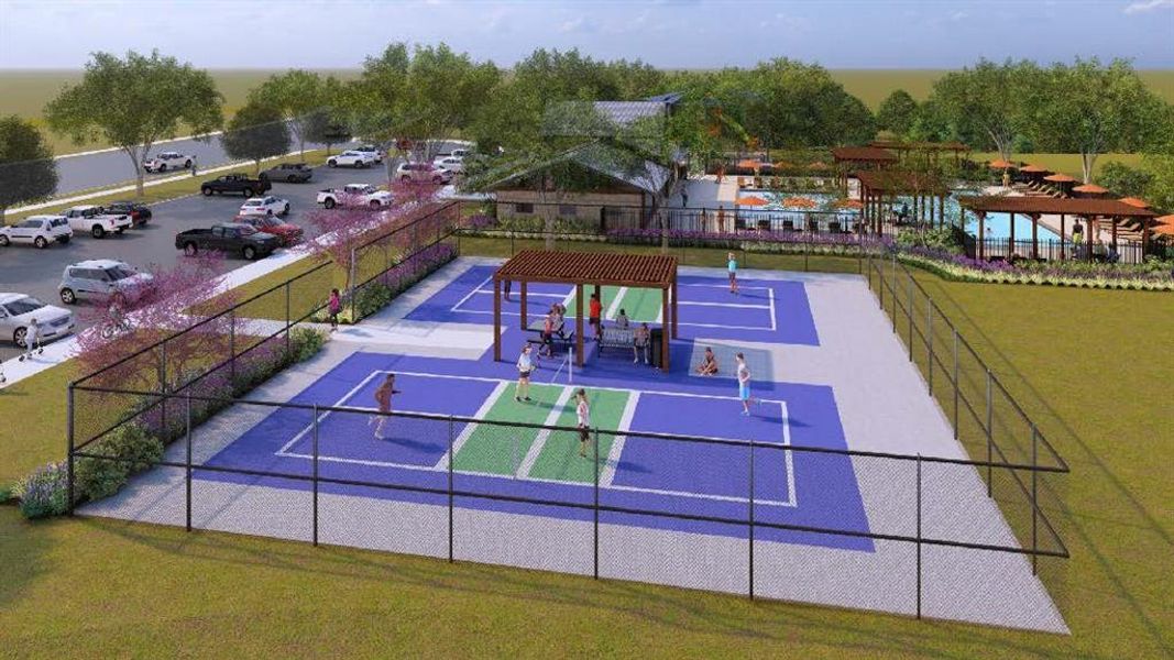 Outdoor recreational area featuring multiple courts with blue and green surfacing, a wood pergola, and surrounding perimeter fencing