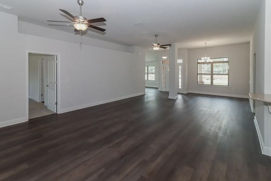 Representative unfurnished interior of a home built from the Plan 2502 by Adams Homes in Cedar Creek at Deerpoint Lake, Panama City (Image 18).