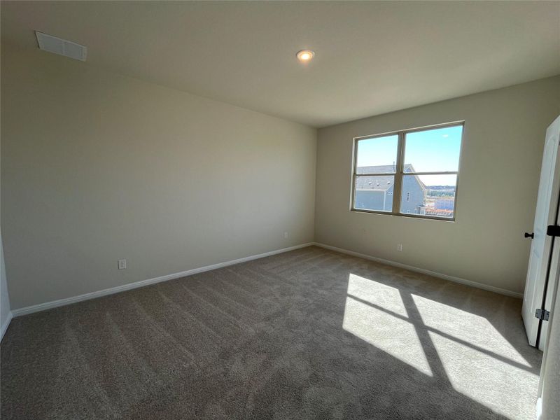 Spacious, unfurnished interior of a new home in The Cottages at Lariat, Liberty Hill (Image 20).