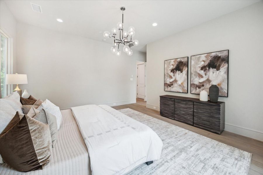 Primary Suite recieves abundant natural light, making this space a tranquil retreat.