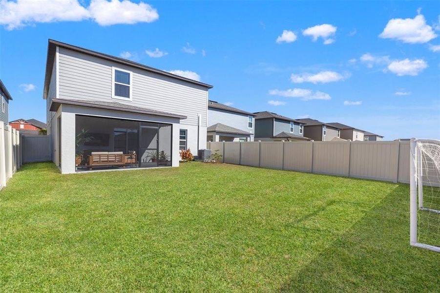 Exterior details and patio area of a home in Connerton, Land O' Lakes (Image 21).