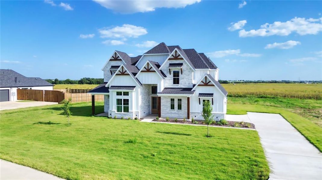 Front exterior of a new home in , Midlothian, TX, highlighting curb appeal (Image 2). Front exterior of a new home in , Midlothian, TX, highlighting curb appeal (Image 2).