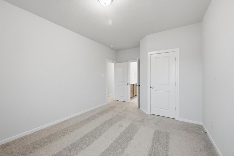 Spacious, unfurnished interior of a new home in Canterra Creek  60', Iowa Colony (Image 22).