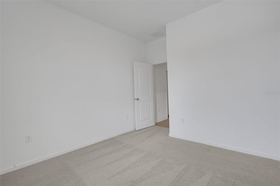 Spacious, unfurnished interior of a new home in Annabelle Estates, Winter Haven (Image 20).