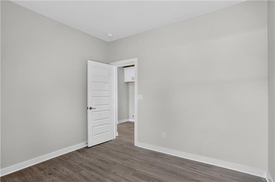Spacious, unfurnished interior of a new home in The Cottages at East Lanier, Fayetteville (Image 11).