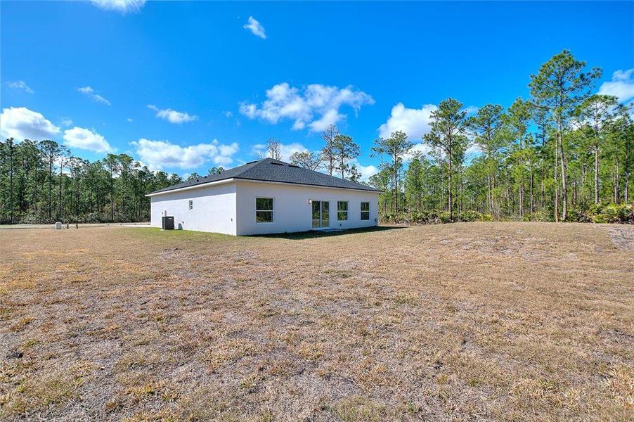 Exterior details and patio area of a home in , Indian Lake Estates (Image 28).