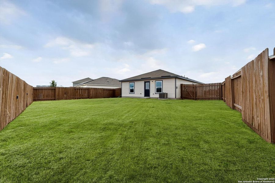Exterior details and patio area of a home in Savannah Place, San Antonio (Image 2). Exterior details and patio area of a home in Savannah Place, San Antonio (Image 2).