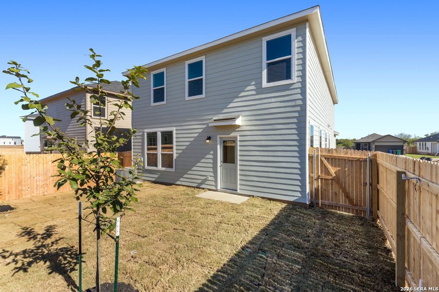 Exterior details and patio area of a home in Southton Cove, Elmendorf (Image 3).