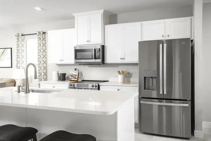 Furnished interior view inside a new home in Emerald Fields Villas, Hudson (Image 2).