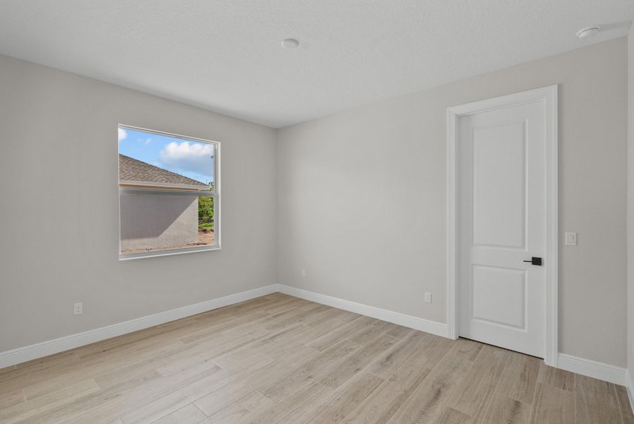 Representative unfurnished interior of a home built from the Weston Signature by GHO Homes in High Pointe, Vero Beach (Image 26).
