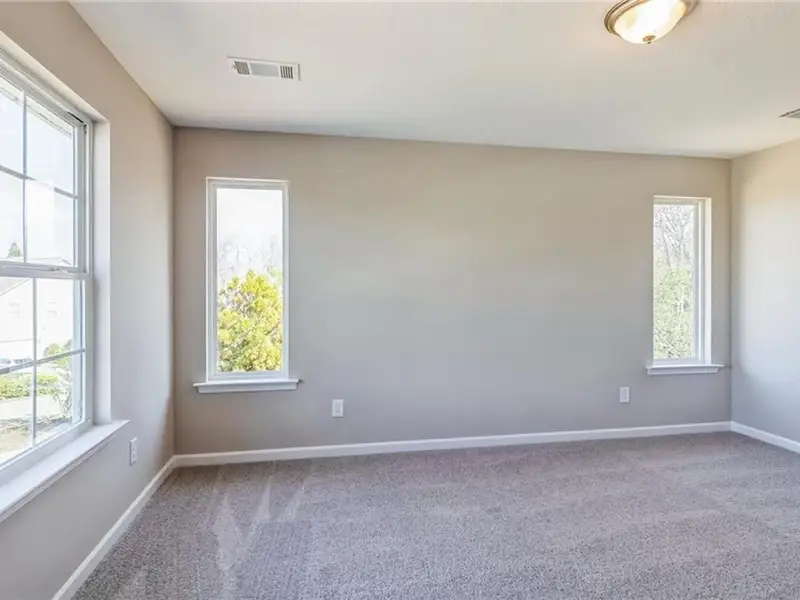Spacious, unfurnished interior of a new home in Ivy Glen, Perry (Image 7).